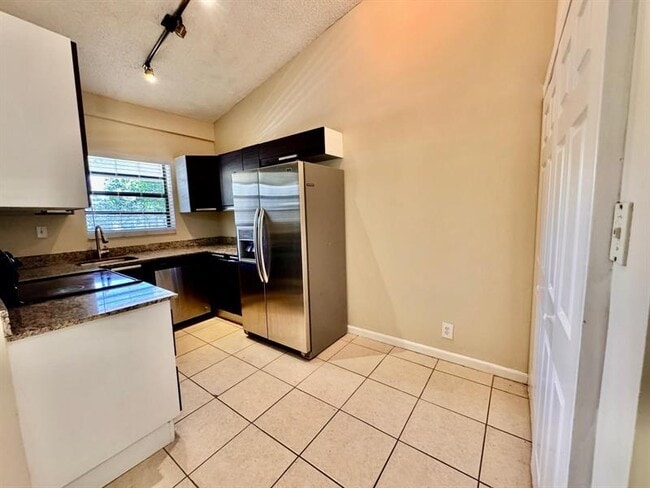Photo - 11211 Royal Palm Blvd Unit 11211