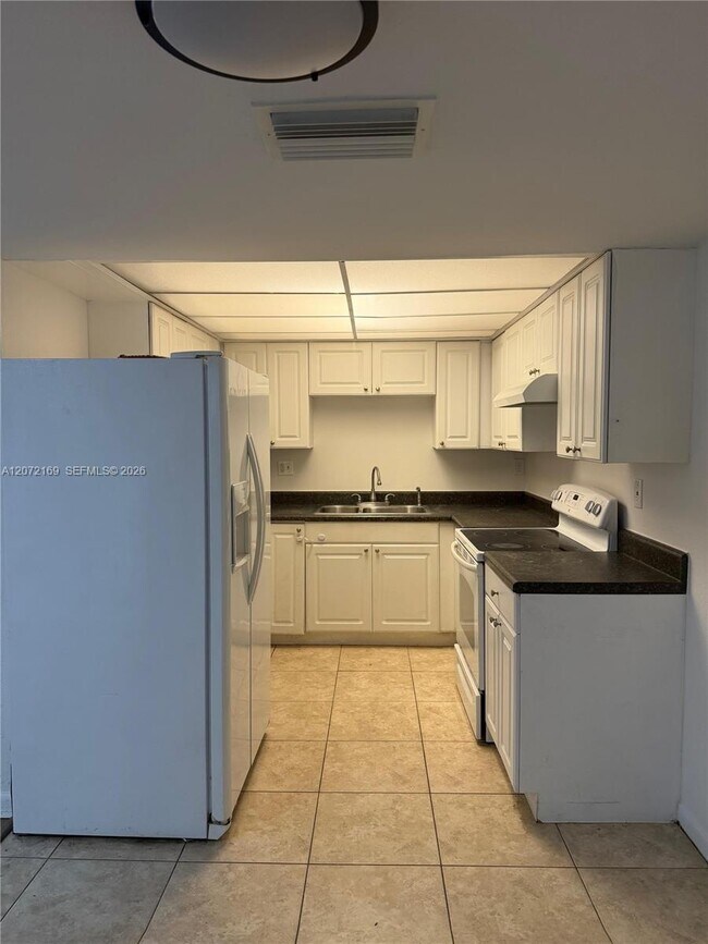 11101 Royal Palm Blvd Unit 203