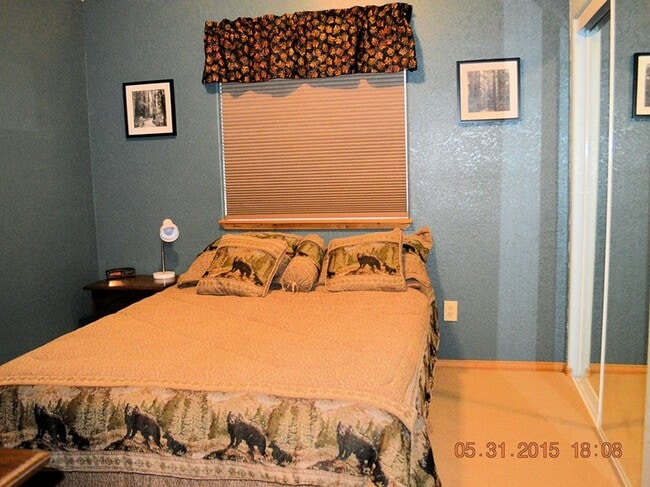 First bedroom with king bed (linens, sheets, comforter not included in furnishing) - 24771 Amber Drive Unit 2BR Apartment