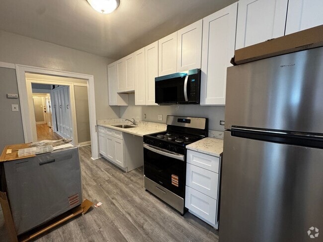 Building Photo - 6439 N Leavitt St Unit 1S Rental