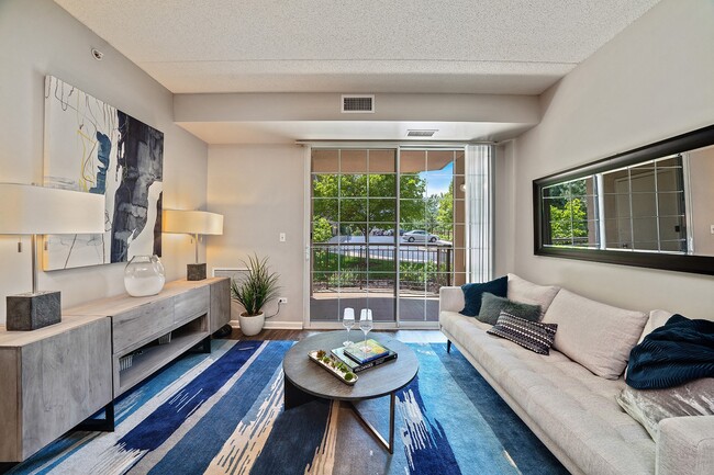 Living room with patio access and natural light