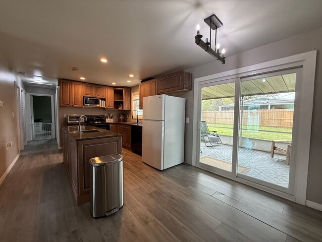 Photo - Spacious 4-bedroom, 2-bath pool home