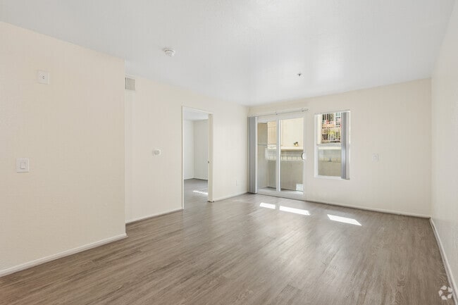 2BR, 2BA - 798SF - Dining Room and Living Room