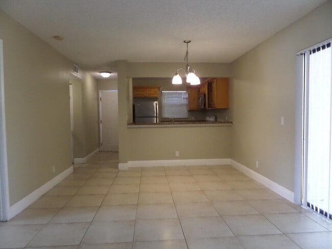 Building Photo - 1440 Windorah Way Unit D