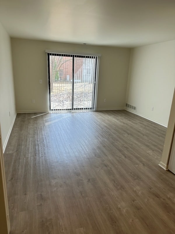 2BR, 1BA - 900SF - Living Room with Patio - Bradford Square