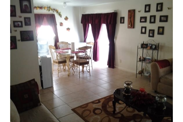 living and dining rooms - Peak Bay Apartments & Condos