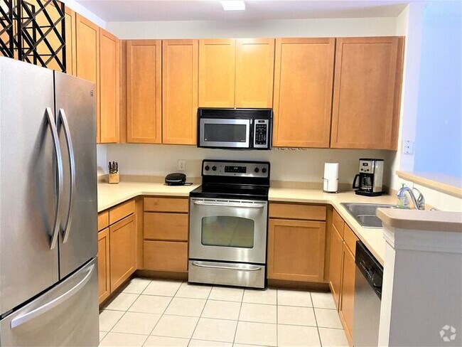 Building Photo - Furnished! Cozy one bedroom with large bed... Unit 208 Rental