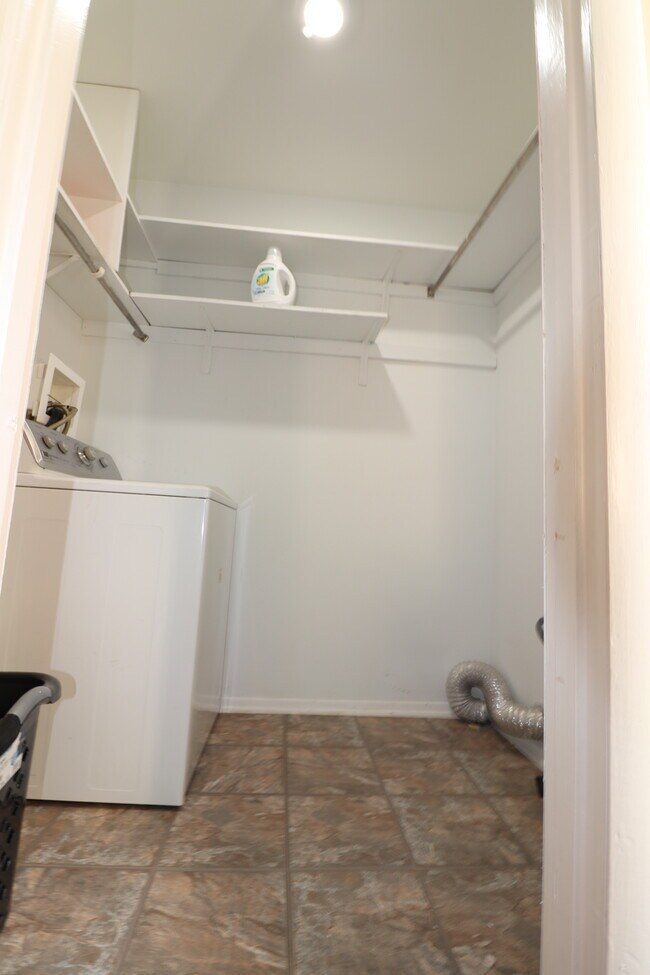 Laundry room - 8227 Santa Fe Dr Unit Lowell Condominiam