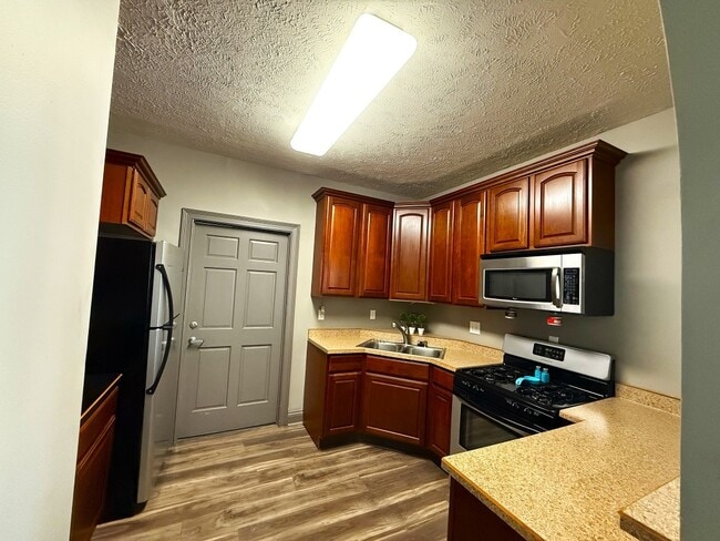 Clubhouse Interior Kitchen Amenities at Ashmore Trace Apartments