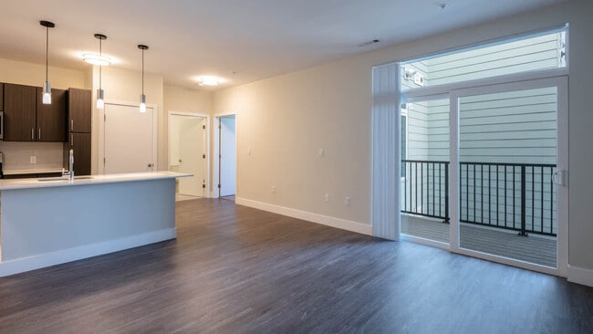 Living Room with Balcony and Hard Surface Flooring