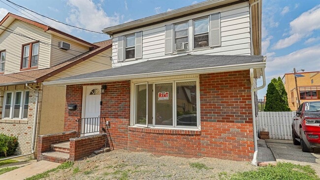 Building Photo - 1120 73rd St Unit 1