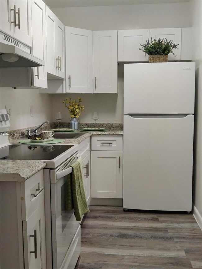 Building Photo - 5950 NE 18th Ave Unit 509