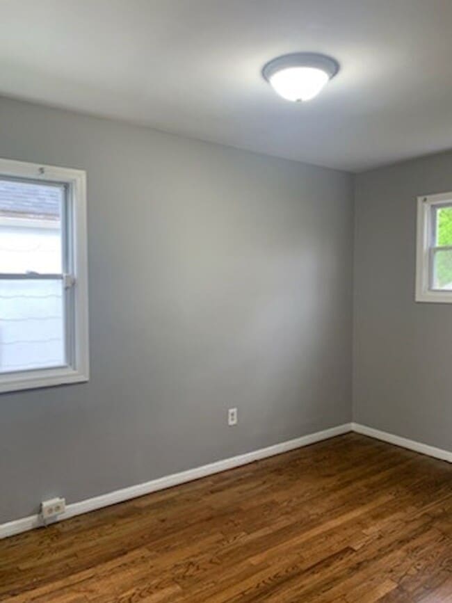Photo - Move-In Ready 2BR Home w/ Refinished Hardwood Floors + Bonus Room Basement!