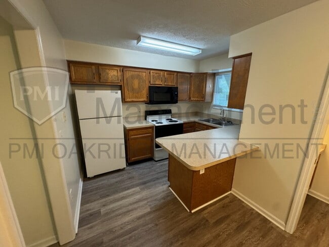 Photo - Two Bedroom Townhome with Attached Garage Unit A