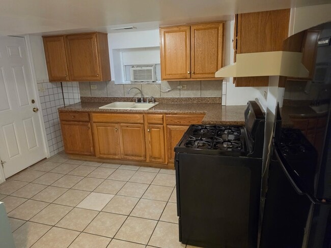 Photo - 1408 W 94th St Unit Garden Apartment