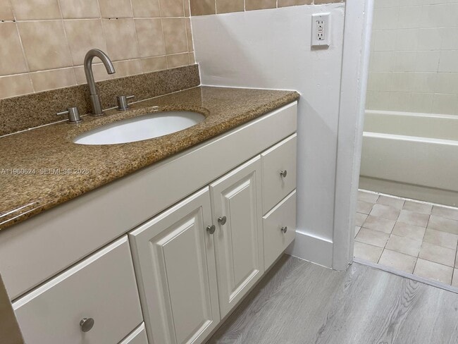 Photo - 1075 W 68th St Unit 304