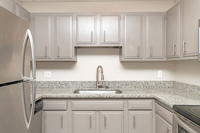 Kitchen with granite counters and stainless appliances