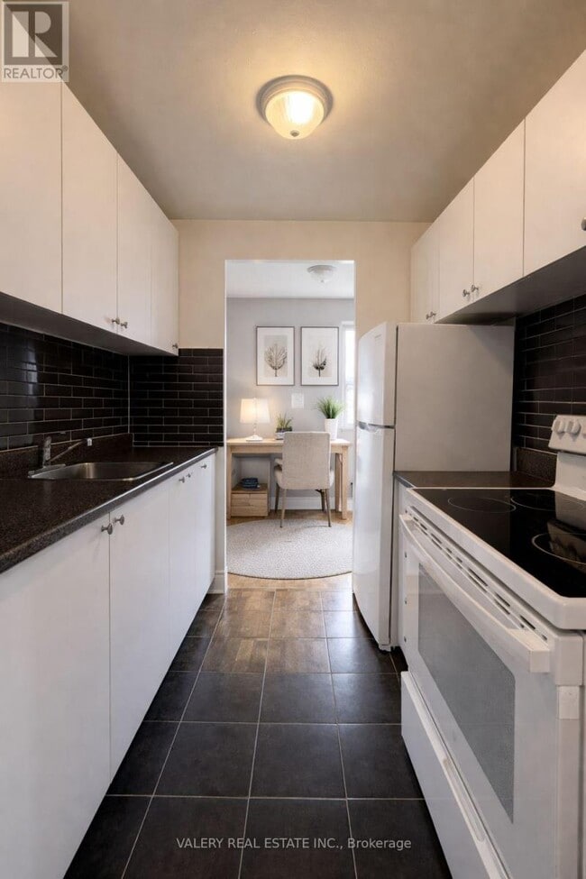 Photo - 1002 Lawrence Ave E Unit 104