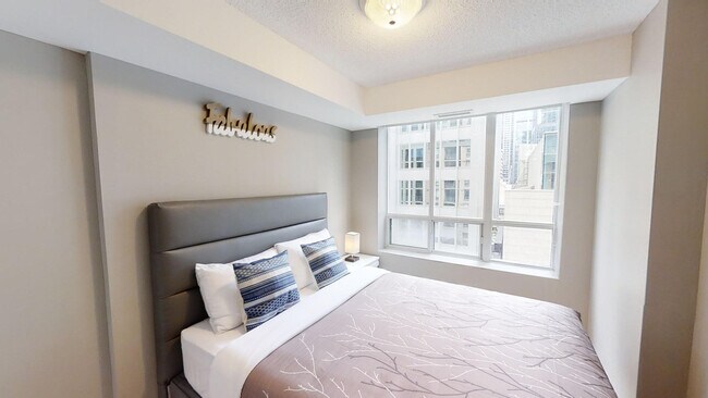 Photo - 136 Simcoe St Unit FL1-ID1031081P