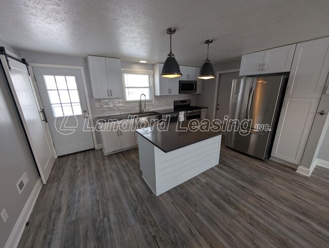 Photo - Updated 3-Bedroom Split-Level with Open Kitchen & Finished Lower Level