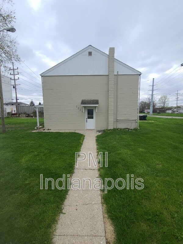 Building Photo - 1311 E 11th St Unit 3 Rental
