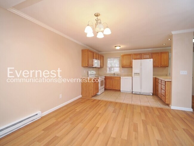 Photo - 2 Bed, 1.5 Bath Condo with Off-Street Parking / Available Now! Unit Apartment E206