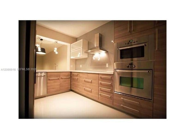 Building Photo - 10730 NW 66th St Unit 303