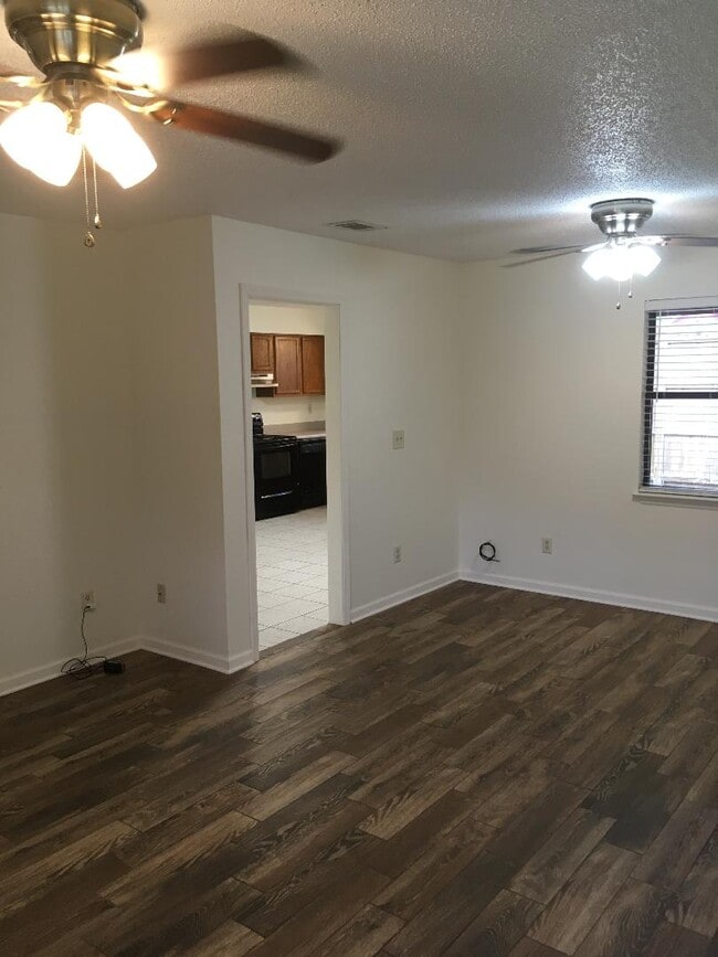 Main living room into eat in kitchen