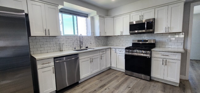 Photo - 4651 W 18th St Townhome