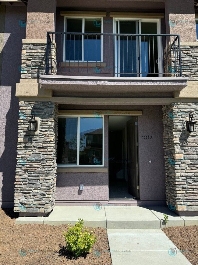 Building Photo - Comfort Meets Convenience in This Beautiful Two-Story Condo with Spacious Living Areas