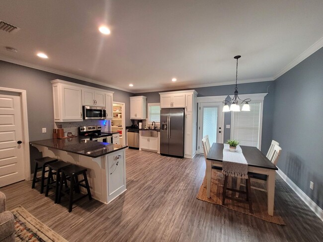 Photo - Elegant 4-Bedroom Home with Gourmet Kitchen, Luxurious Primary Suite & Fenced Yard in Hahira!