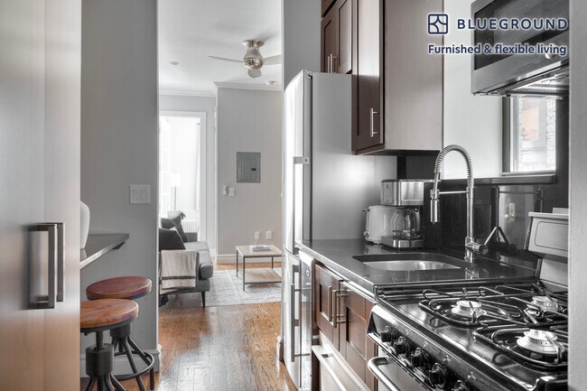309 E 8th St Unit SI FL1-ID1115