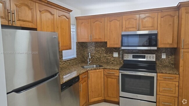 Building Photo - 4675 NW 22nd St Rental