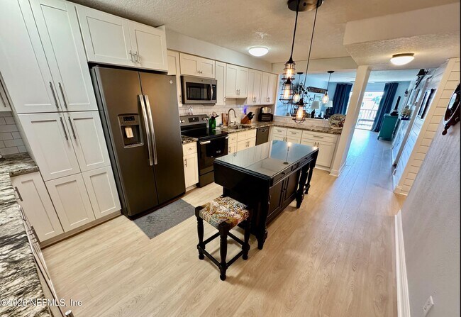 Photo - 8711 Blind Pass Rd Unit 208A