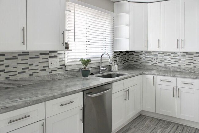 Photo - Charming Corner Lot Brick Home With 3-Bedr...