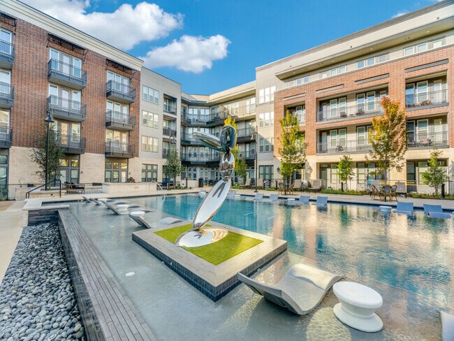 Dos piscinas estilo resort - The Beacon