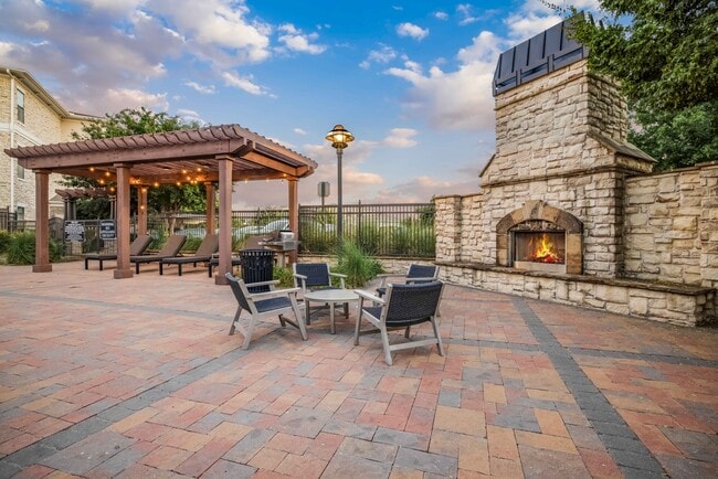 Poolside Fireplace with Cozy Seating