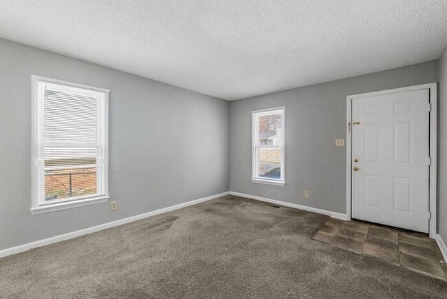 Photo - NE Home - Updated Kitchen and Bathrooms! SS Appliances, Fire Place, Front Porch & Deck, Fenced Yard!