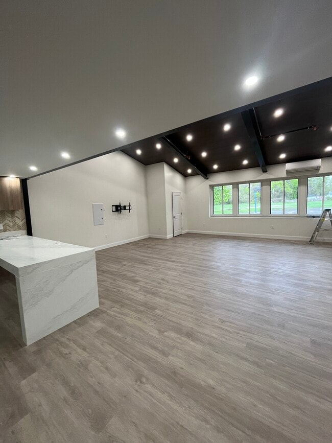 Photo - 64 Sand Creek Rd Unit main building