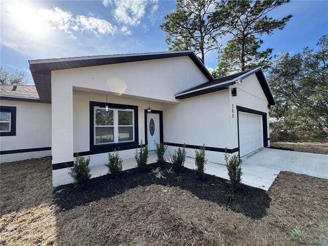 Photo - 702 Marion Oaks Manor