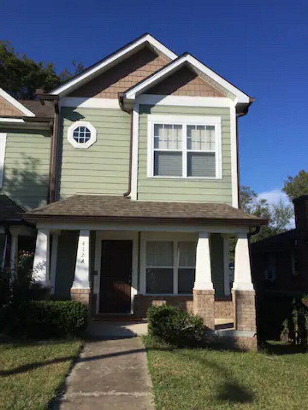 Charming exterior with small front lawn and large back yard. - 412A McClellan Ave (Nashville, TN)
