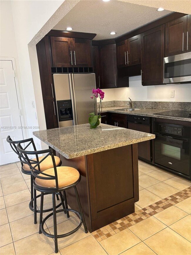 Building Photo - 7160 NW 179th St Unit 302