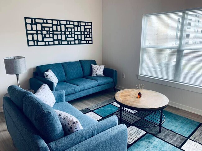 Living Area with Large Double-Paned Windows - Mission Trail at El Camino Real Rental