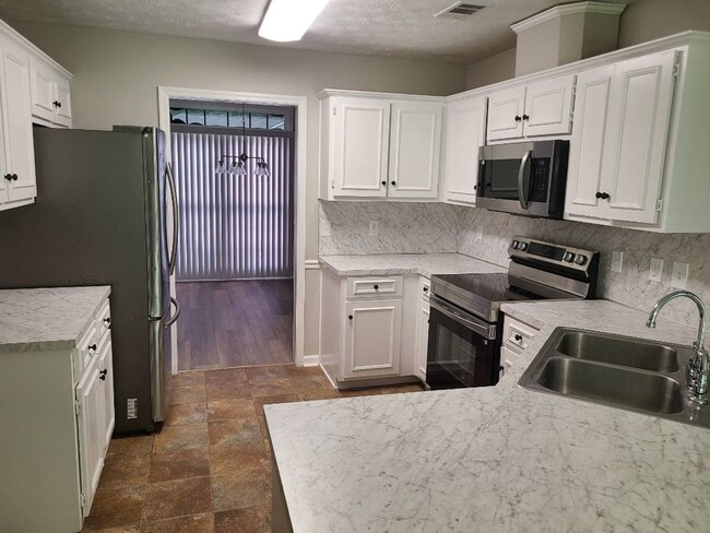 Photo - Rent ready 4 bedroom/ 2 bathroom