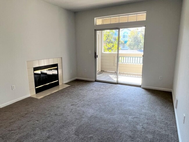 Photo - Spacious 2BR/2BA Redwood Shores Condo with Balcony, Natural Light & Garage Parking