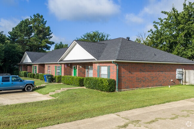 Building Photo - Whispering Pines Apartments