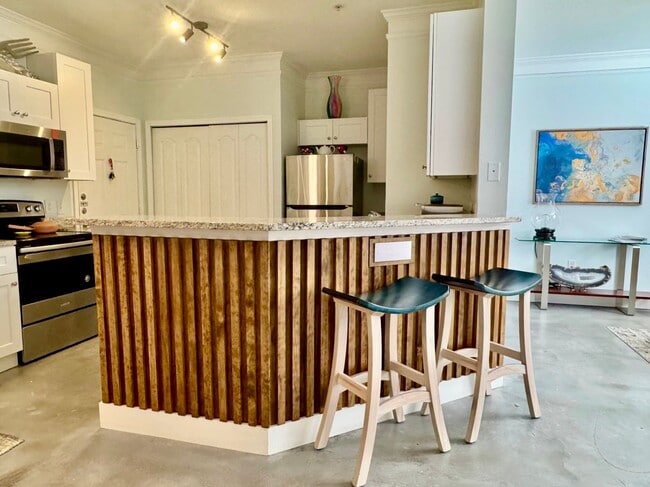 Photo - 2 Bedroom/ 2 Baths / 2 Car Garage Condo Fo... Unit 108
