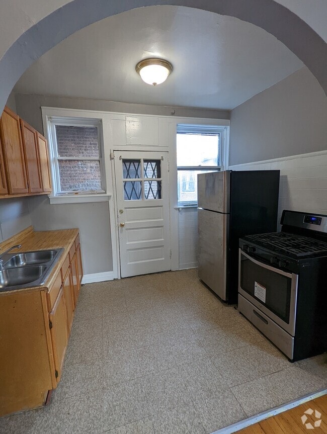 Building Photo - 5455 S Everett Ave Unit 3B Rental