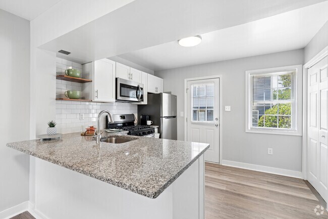 2BR, 1.5BA - 785SF - Kitchen - Avenue C Apartments