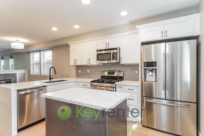 Building Photo - **Rent Special** Modern 3 Bedroom with Off...